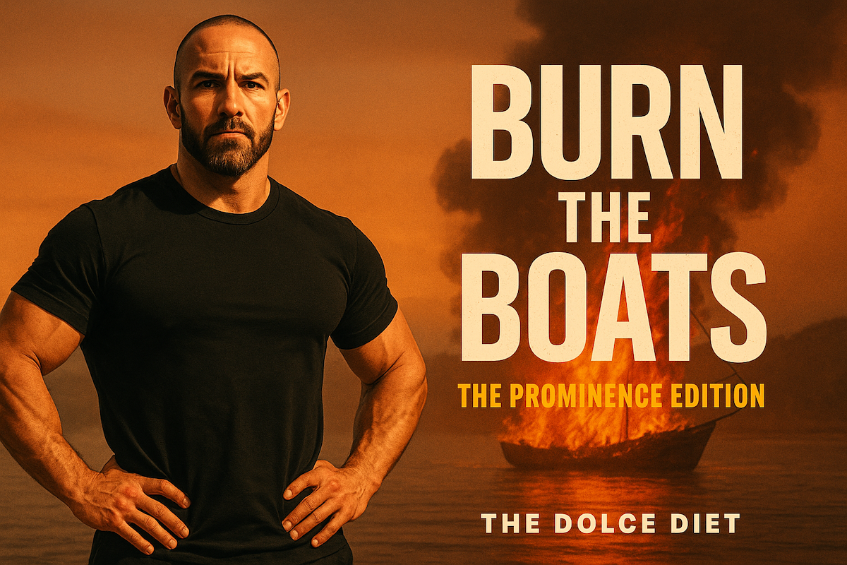 Mike Dolce stands powerfully on a rocky shore with a burning boat in the background. Bold text reads Burn the Boats